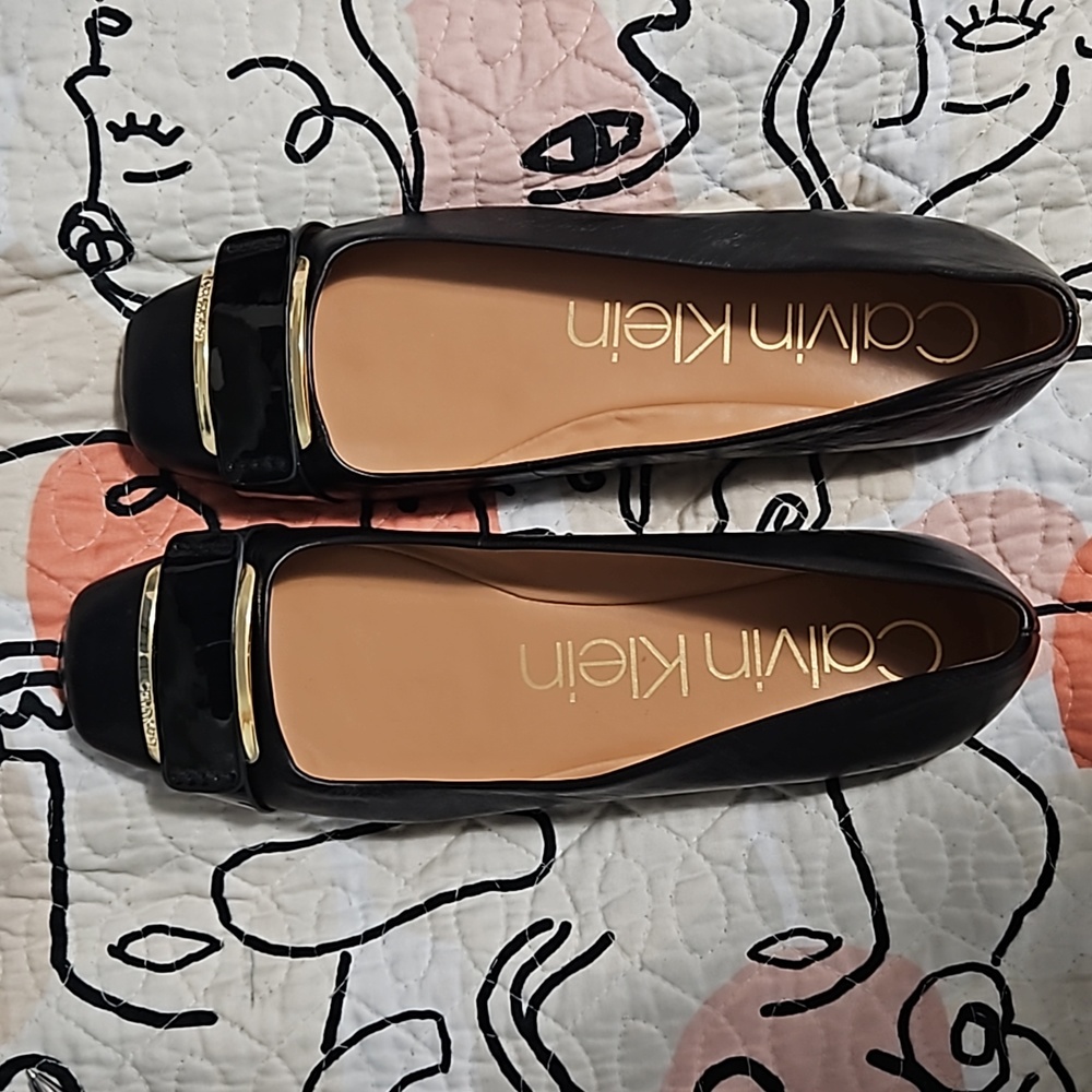 Calvin Klein Black Patent Leather Ballet Flats with Gold Accent